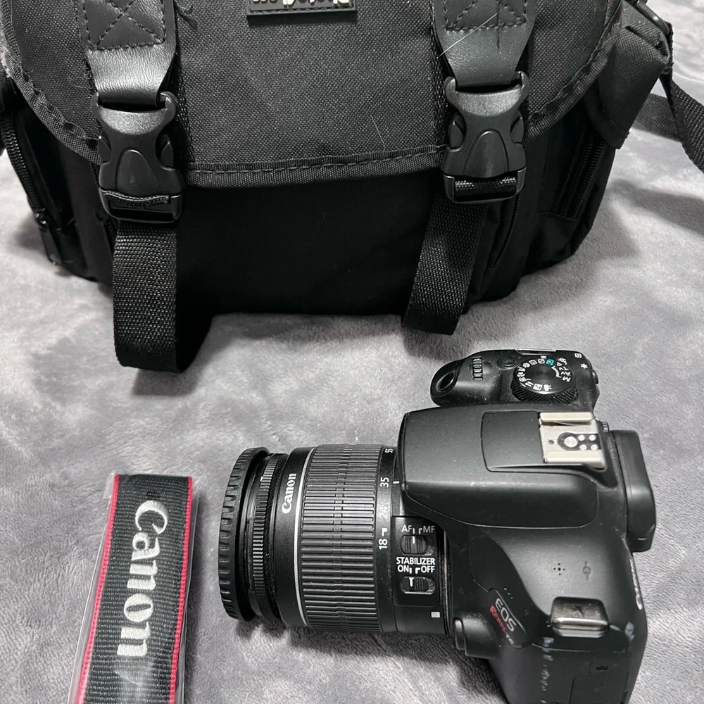 Canon Camera and a full kit with a bag and two additional lenses